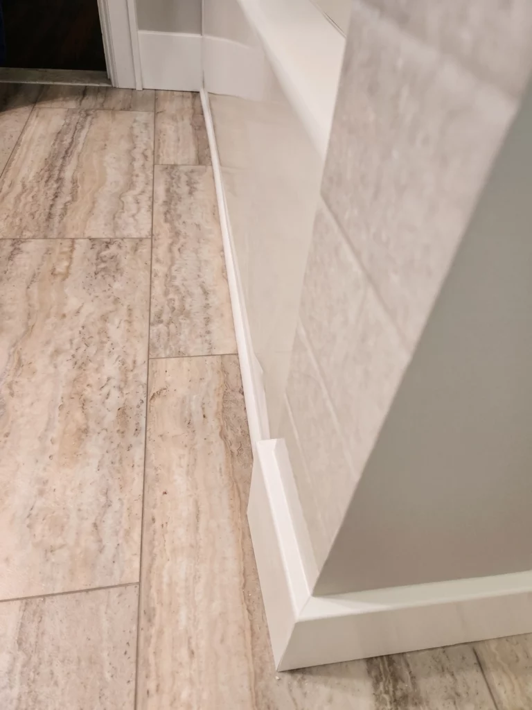 Custom trim and tile work as part of a Dewitt NY bathroom remodel by Bath Pros